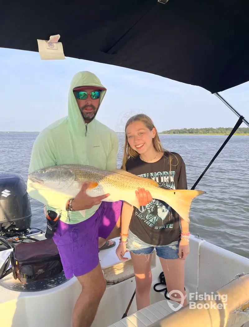 Family Shark Fishing & Dolphin Discoveries 1 charter image 3